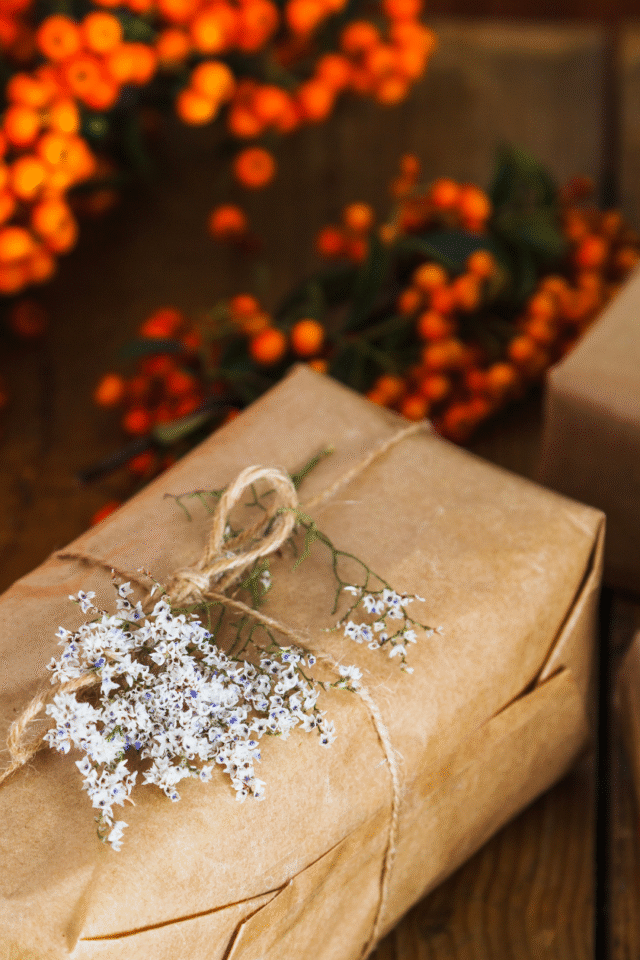 Holiday-themed setting with wrapped gifts under a decorated tree