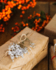 Holiday-themed setting with wrapped gifts under a decorated tree
